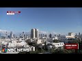 Air raid sirens sound across Tel Aviv on live TV