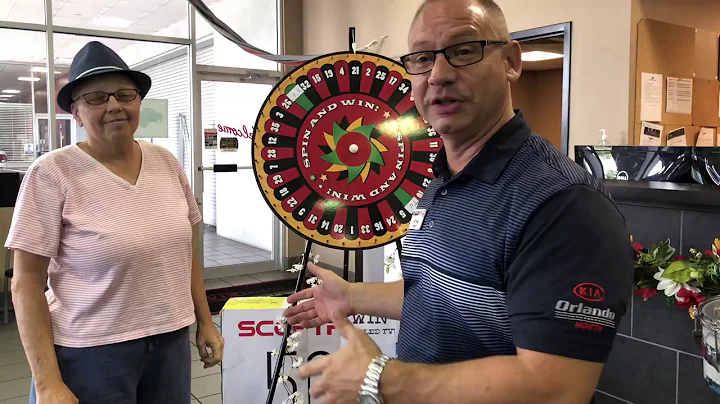 Linda Carraway Spinning the Prize Wheel to win the...