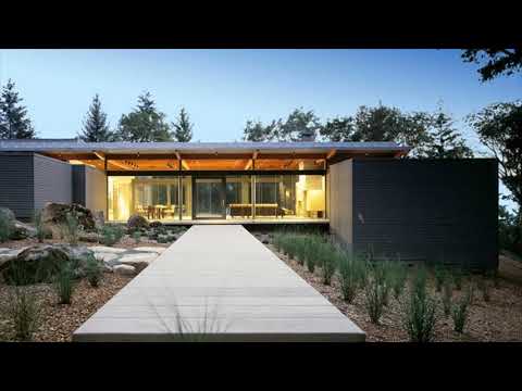 वीडियो: एक दिलचस्प वास्तुकला के साथ ग्लास निवास: झील लुगानो हाउस