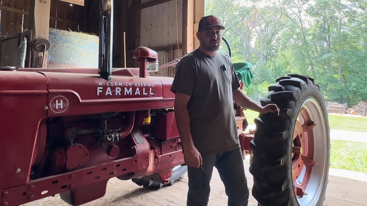Farmall H gets new rims and tires - YouTube