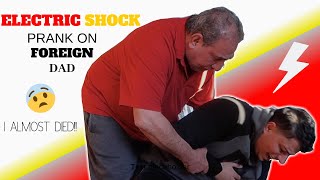ELECTRIC SHOCK PRANK ON FOREIGN DAD!!! (I ALMOST DIED)