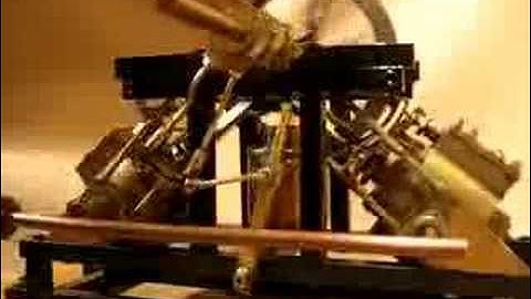 Oscillating twin cylinder steam engine with Stephenson gear