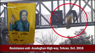 Putting up Maryam Rajavi’s banner by a resistance unit in the Azadeghan High way, Tehran