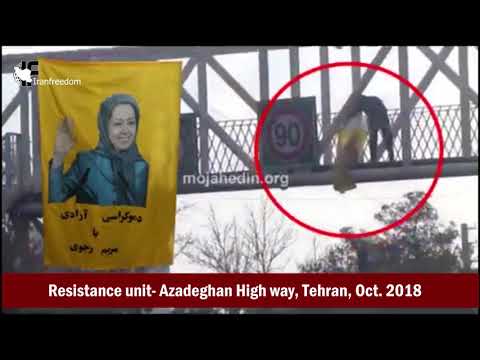 Putting up Maryam Rajavi’s banner by a resistance unit in the Azadeghan High way, Tehran