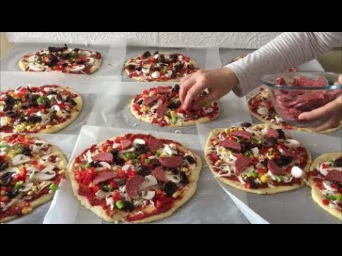 Video: Dondurulmuş pizza daşını pizzada necə istifadə etmək olar?