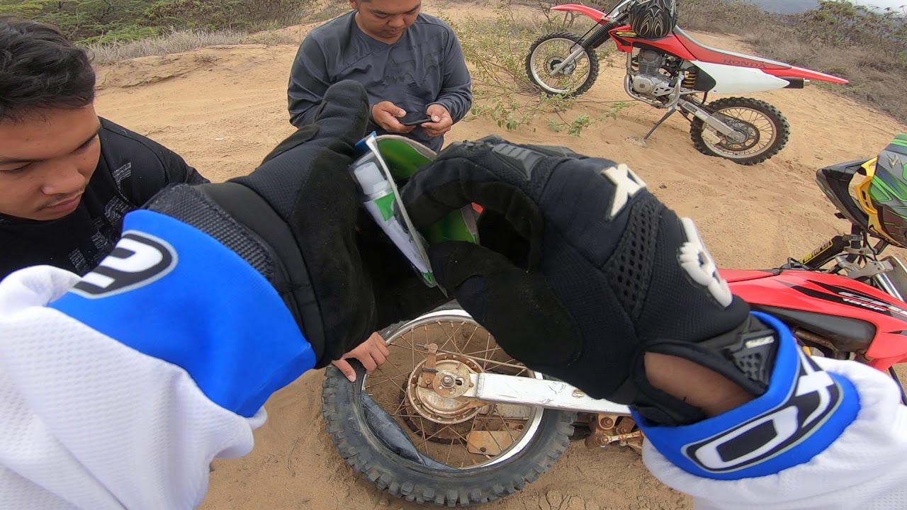 Changing dirtbike tube on the trail YouTube