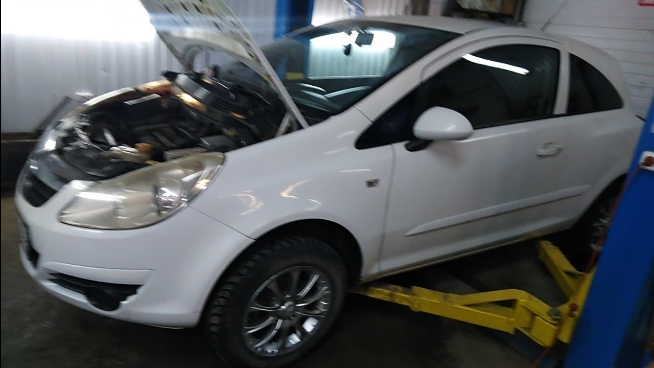 Замена передних стоек и тормозных дисков Опель Корса D - YouTube