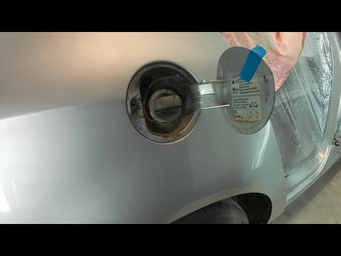 Как снять лючок бензобака на фольксваген тигуан видео