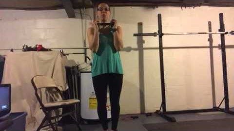 Sumo squat jump with a bicep curl