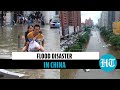 China: Deadly floods kill over 20; people stuck in subway rescued; dams damaged