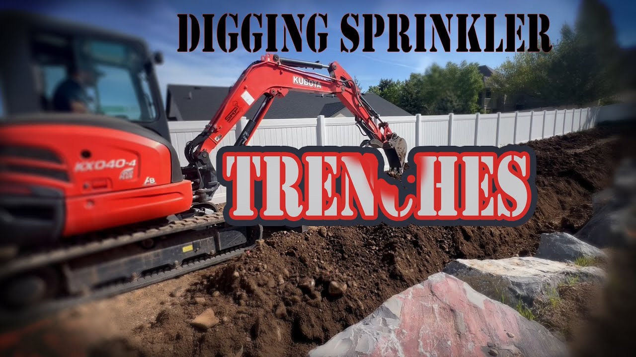 Digging Sprinkler Trenches with the Kubota KX040-4 - YouTube