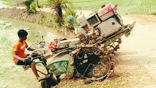 Power tillers are being taken down from the road for cultivating the land