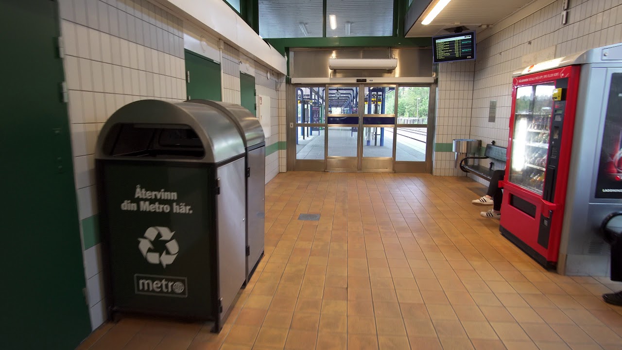 Sweden, Stockholm, Stuvsta train station, 1X escalator ride up to platform level