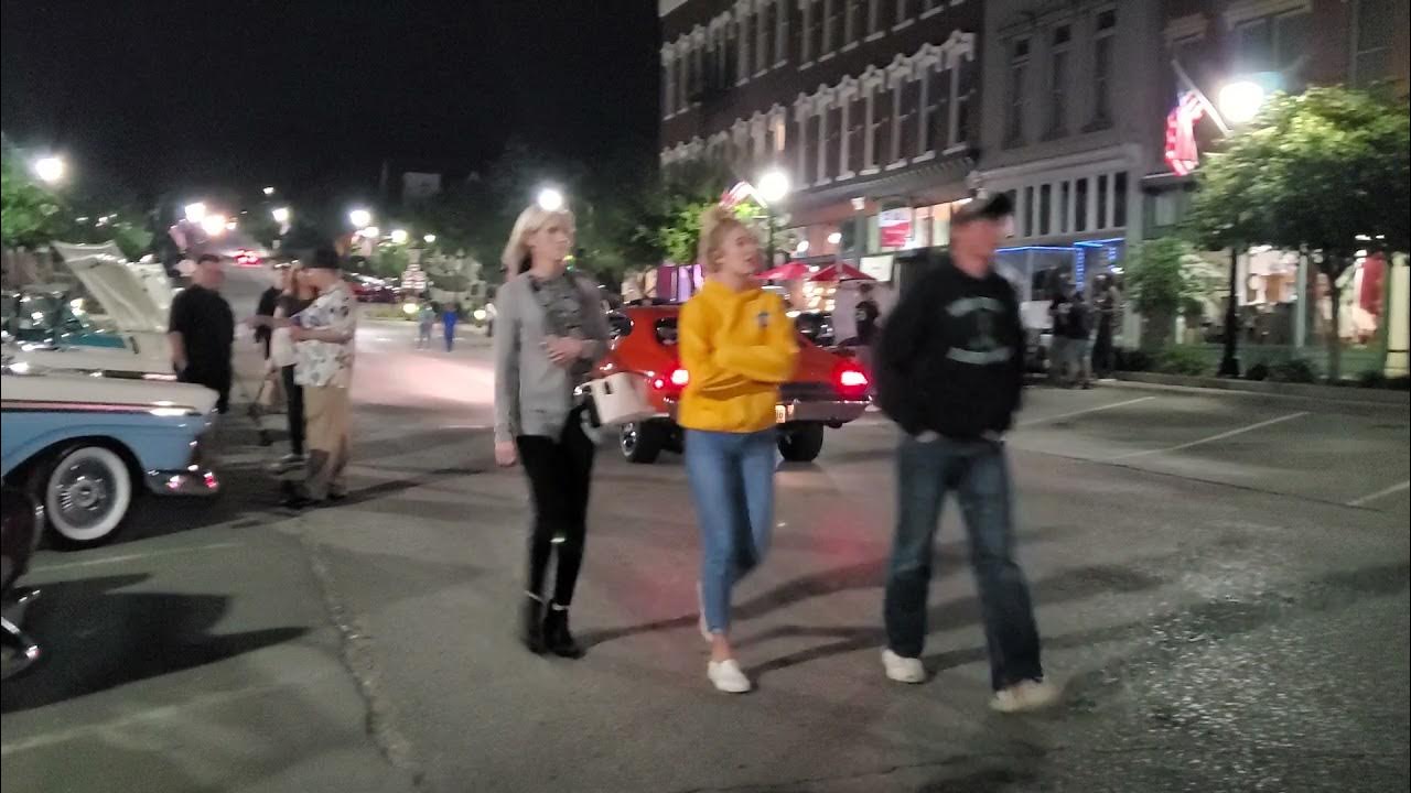 Cars leaving the 2021 Cruizin' Main Car Show in Plattsmouth, Nebraska