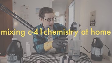 mixing CineStill chemistry to process 30 rolls of film