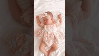 Dreamy Luna Wearing Our Beautiful Erfly Kisses Peach Rose Romper