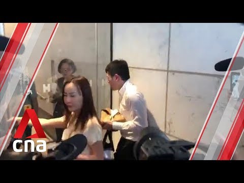 Chinese office worker punched by Hong Kong protesters