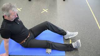 Optrekken Knieschijf, Strekken Knie Over Handdoekrol, Strekken Heffen2