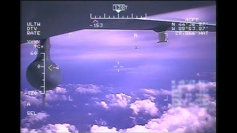 Surveillance Video of UAV Drone in Air to Air Tracking and Reconnaissance of  Executive Jet Aircraft