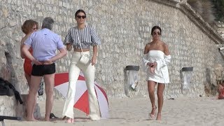 Exclusive - Kendall Jenner and Kourtney Kardashian take a walk on the beach in Cannes