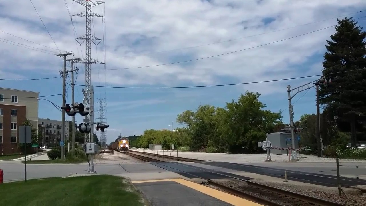 UP 3012 (SD70AH-T4) returns south, leading CP 812 through Morton Grove!