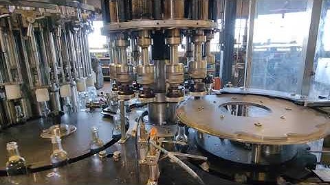 Monoblock Filler/Capper as well as a Weiler Vertical Labeler - Turnkey System running 50 mLbottles