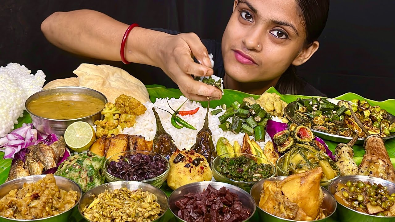 Dal Chawal Aloo Bhorta Baingan Bhorta Karela Fry Bhindi Fry Gobhi FrySamosa Curry Aloo Matar Eating