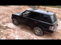 L322 range rover tackling a hard section