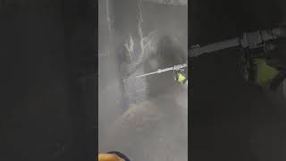 Ice blasting in a chemical holding tank
