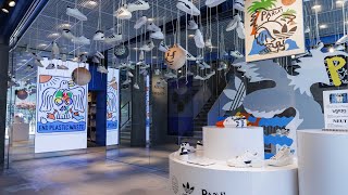 What makes Adidas a leader in creating experiential retail spaces?