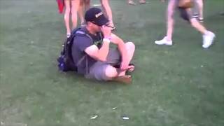 Wasted guy and his flip-flops at Coachella (Plastic Bag Version)