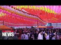 Thousands of Buddhists visit temples to celebrate Buddha