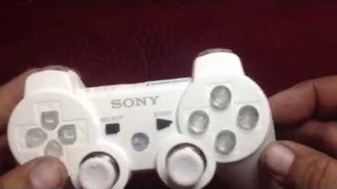 White dualshock 3 wit blue & pink leds
