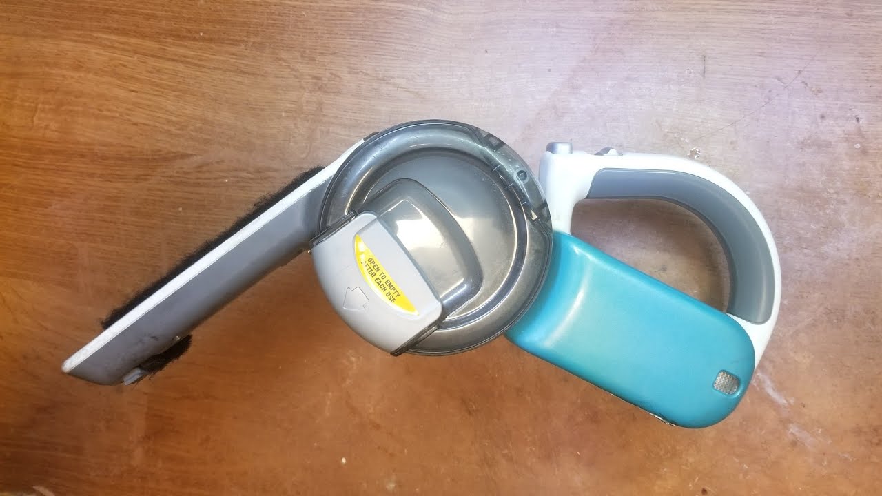 How to replaceable battery in a Black & Decker angled cordless car vacuum?  