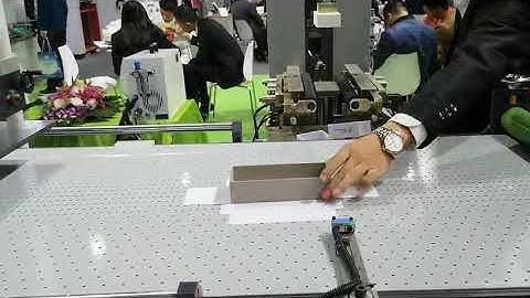Positioning machine: from making box to hard cover, one button change