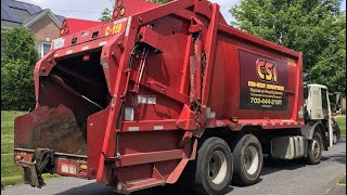 Waste Management's Big Red E-Z Pack Garbage Truck