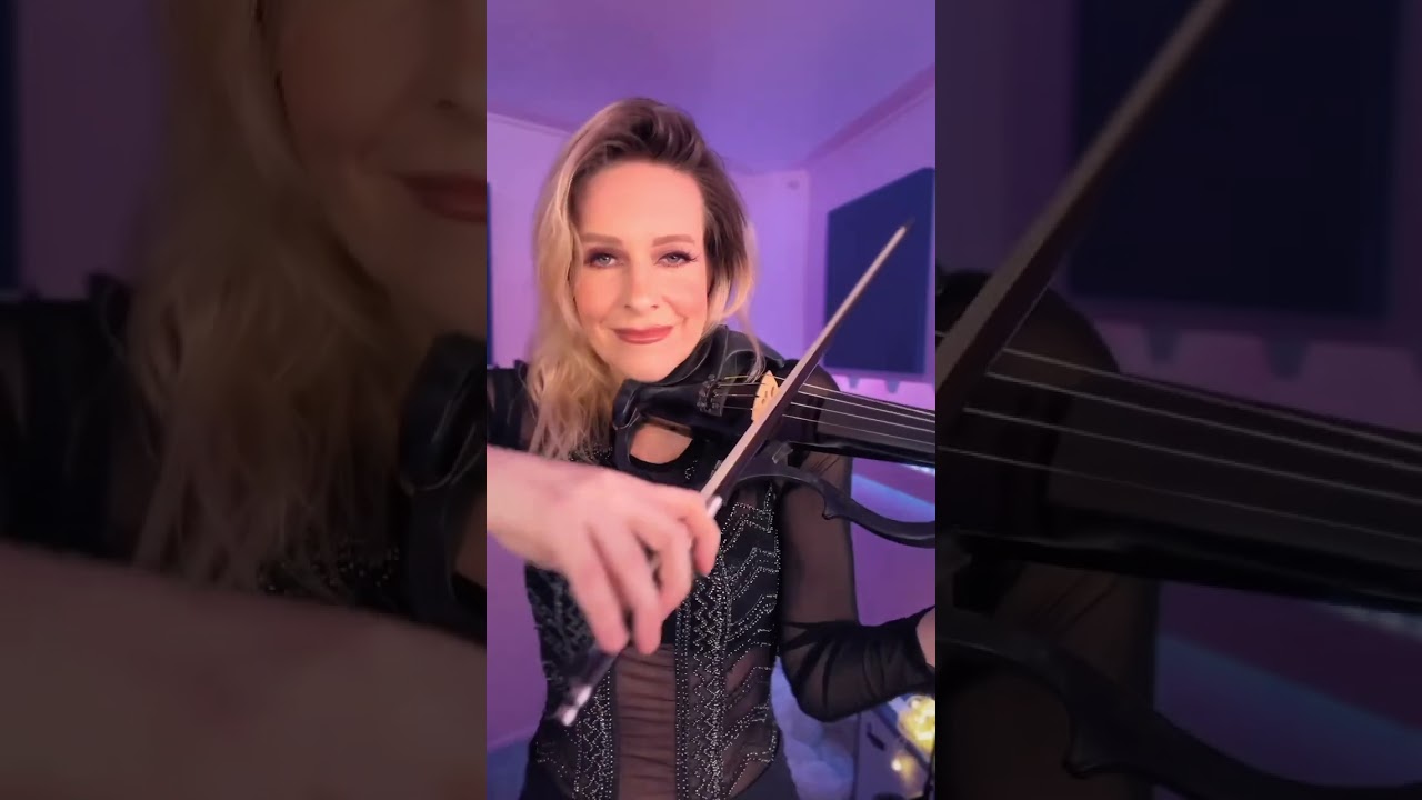 Female electric violinist Rachel performing an interactive live set
