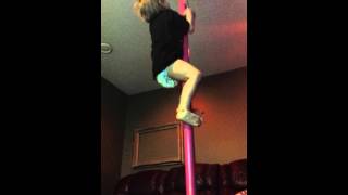Baby strength on stripper pole Baby strength on stripper pole