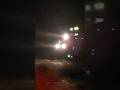 High speed BNSF Grain train on a rainy night