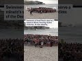 Swimmers at Bondi Beach observe a minute's silence, honoring victims of the Dec. 14 mass shooting