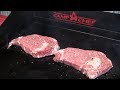 Choice Ribeye Steaks cooked on Camp Chef flat top griddle Aug 2018