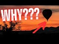 Hanging on for dear life  hot air balloon ride turns into disaster as pilot dangles in the sky