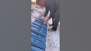The construction of all ceramic rain tile roof- Good tools and machinery make work easy