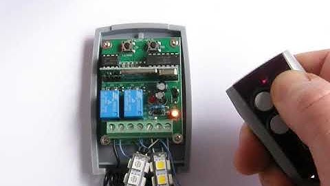 Universal Rolling/Fixed code 2-ch receiver programming video with V2 remote