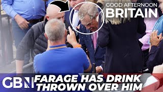 WATCH: Nigel Farage has milkshake THROWN over him in Clacton after rally for candidacy in election