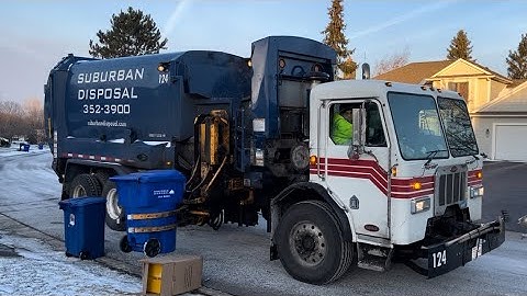 Suburban Disposal Peterbilt Labrie Side Loader Garbage Truck On Post Christmas Garbage