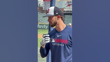 Eli White hitting and signing autographs before facing the Dodgers