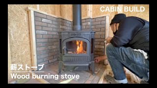 Installed a wood stove in the offgrid cabin. Chimney installation. I made hearth and hearth wall