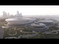 Zaha hadid architects models giant sports venue on hangzhou tea farms  dezeen