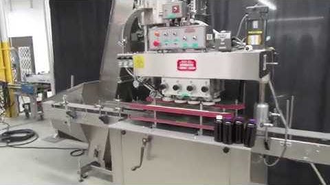 Kaps-All inline capper model C with conveyor, bowl and cap elevator